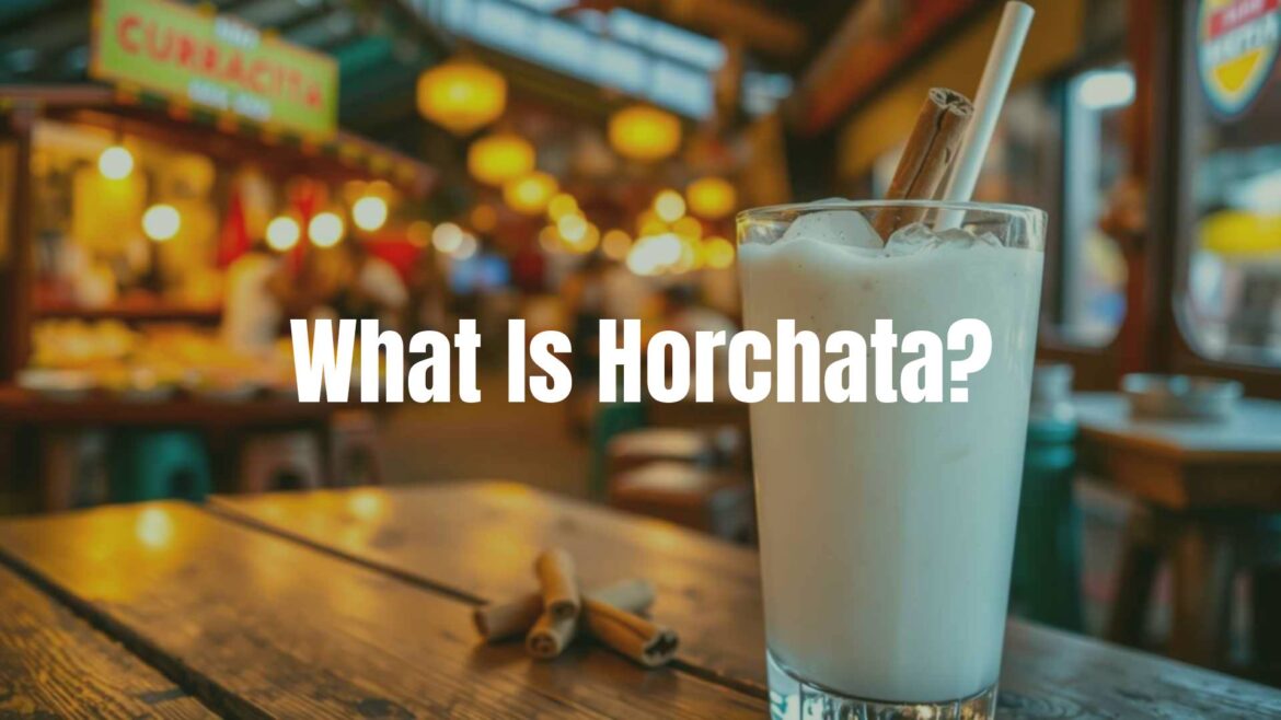 A refreshing glass of horchata with cinnamon stick, ice cubes, and a straw, on a rustic wooden table with Mexican street market background, warm and inviting, realistic.